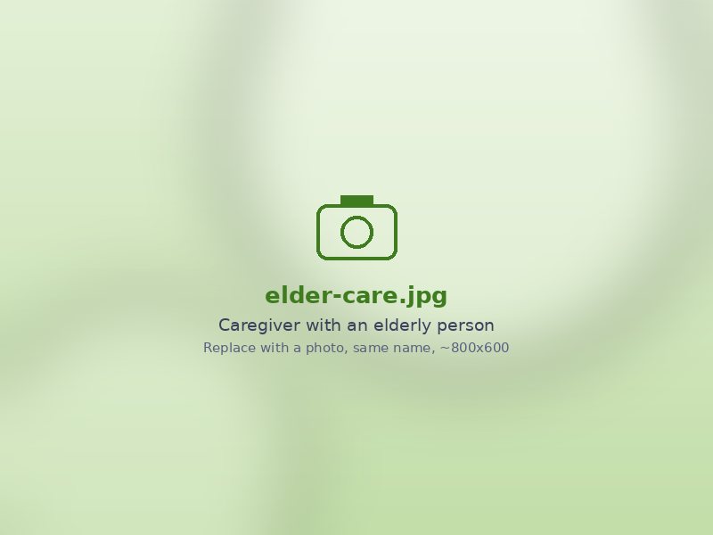 Caregiver sitting with an elderly man